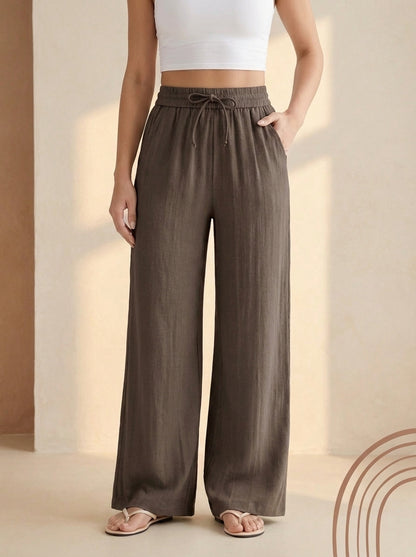 Linen-Feel Wide-Leg Drawstring Pants in Chocolate Martini, worn by a model