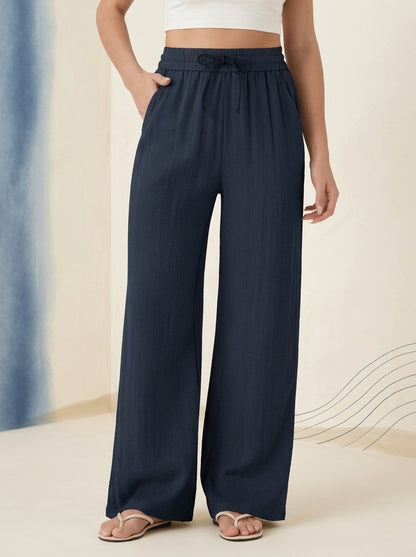 Linen-Feel Wide-Leg Drawstring Pants in Dark Blue, worn by a model