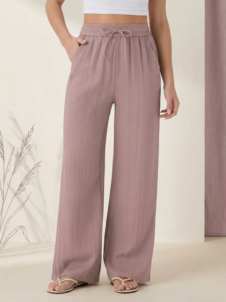 Linen-Feel Wide-Leg Drawstring Pants in Deauville Mauve, worn by a model