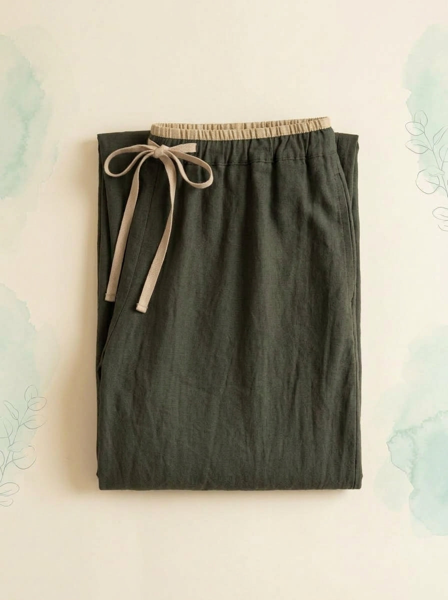 Cotton-Linen Drawstring Pants with Pockets in Dark Olive Green, folded flat