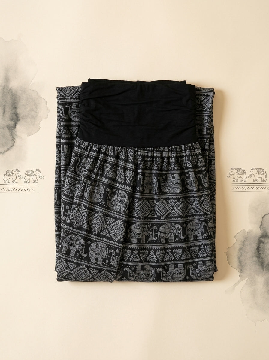 Elephant Print Harem Pants in Black, folded flat