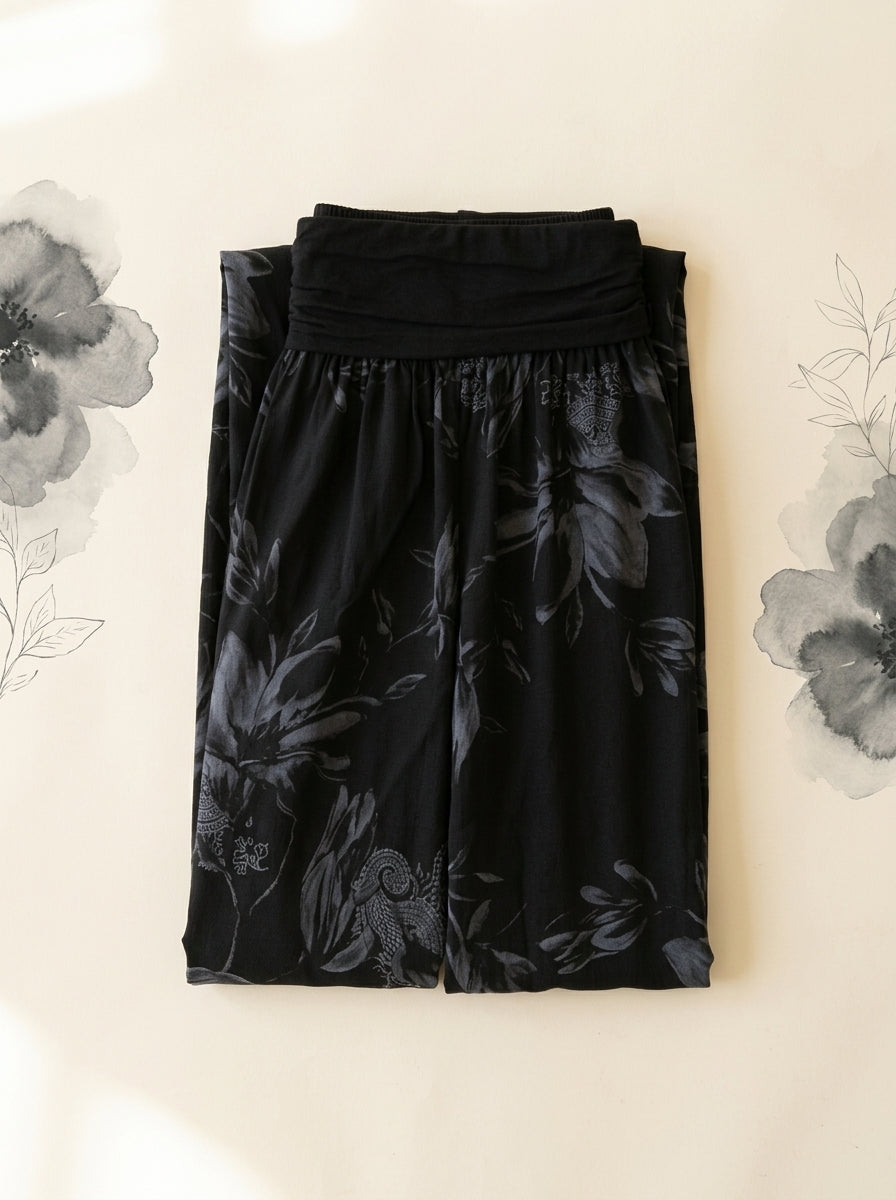 Floral Fold-Over Waist Harem Pants in Black, folded flat