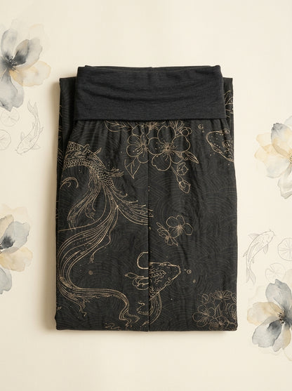 Koi Floral Cotton Harem Pants in Black, folded flat