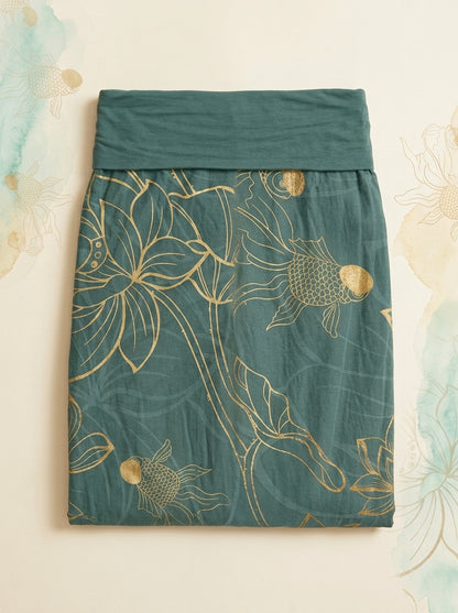 Koi & Lotus Cotton Harem Pants in Dark Cyan, folded flat