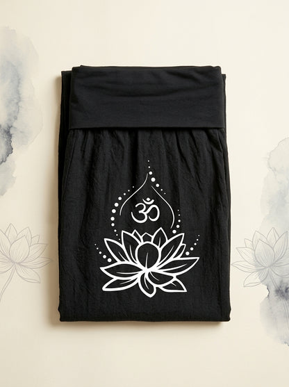 Lotus & Om Cotton Harem Pants in Black, folded flat