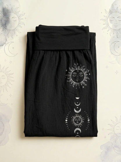 Sun & Moon Cotton Harem Pants in Black, folded flat