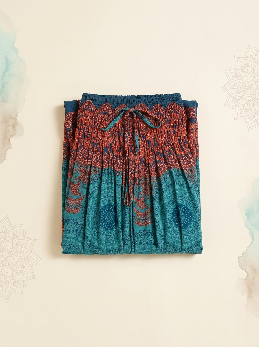 Thai Print Harem Pants in Teal Rust, folded flat