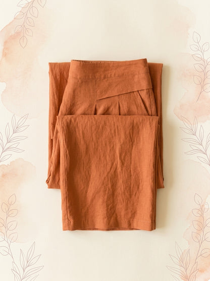 Cotton-Linen Wide-Leg Pants with Pockets in Orange, folded flat